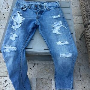 Men’s distressed denim jeans by H&M